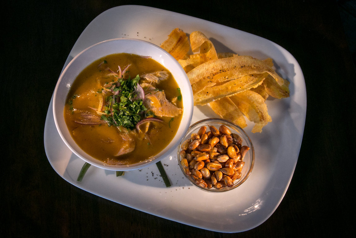 Encebollado: An Ecuadorian fish soup made with fresh tuna, yuca, onion, and cilantro. Served with rice or plantain chips.